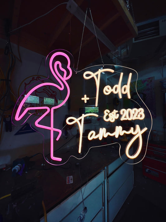 beautiful custom flamingo led neon sign made for Todd and Tammys wedding in 2023