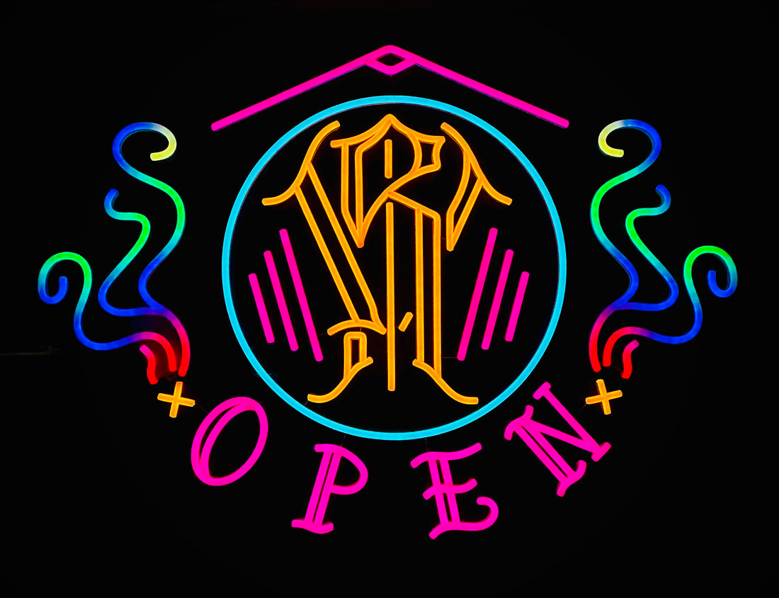 Vibrant addressable RGB Custom LED neon open sign illuminating in storefront window